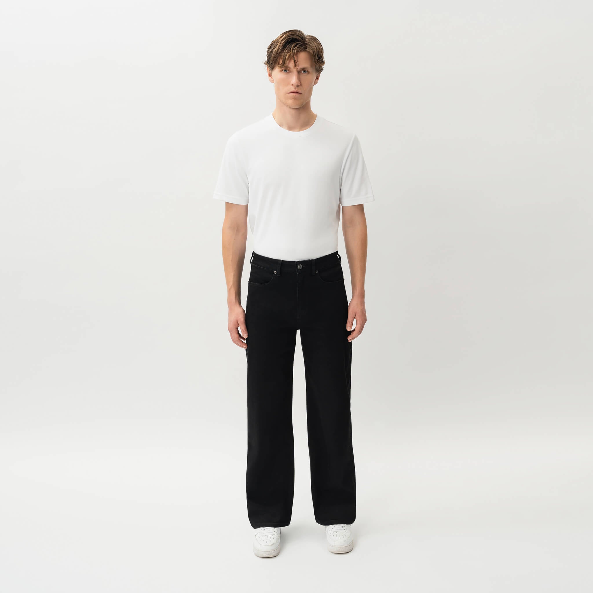 Full-body front view of the Wide Flextech™ Jeans in black