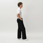 Side view of the Wide Flextech™ Jeans in black