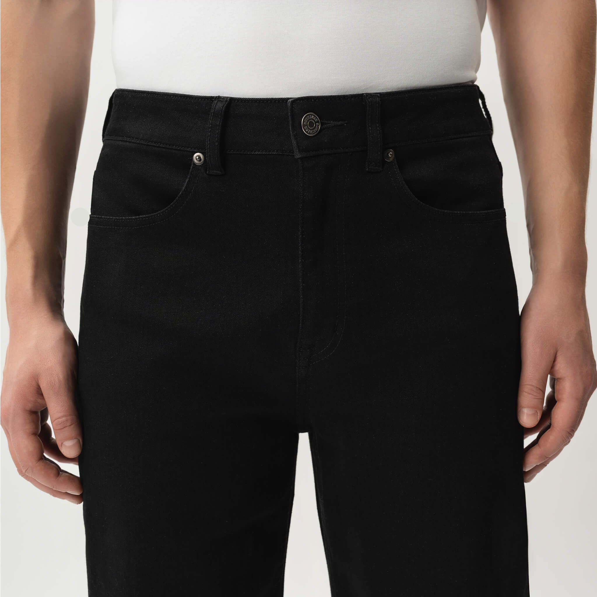 Detail of waistband and pocket construction on the Wide Flextech™ Jeans in black