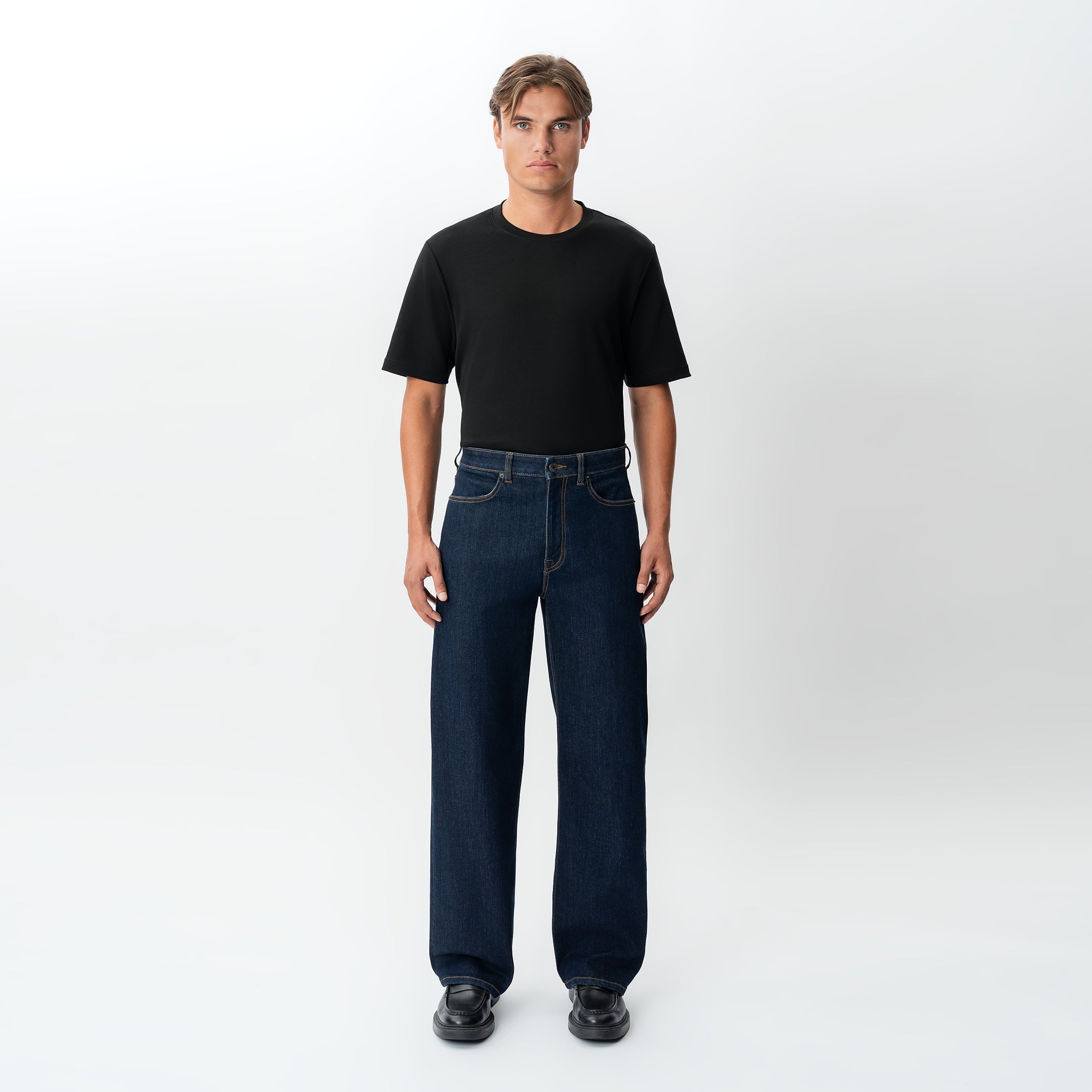 Full-body front view of the Wide Flextech™ Jeans in dark blue