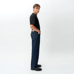 Side view of the Wide Flextech™ Jeans in dark blue showing the relaxed fit
