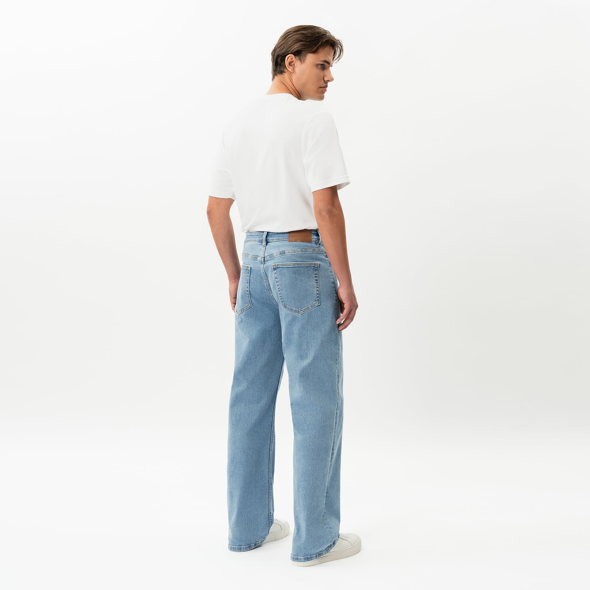 Back view of the Wide Flextech™ Jeans in light blue