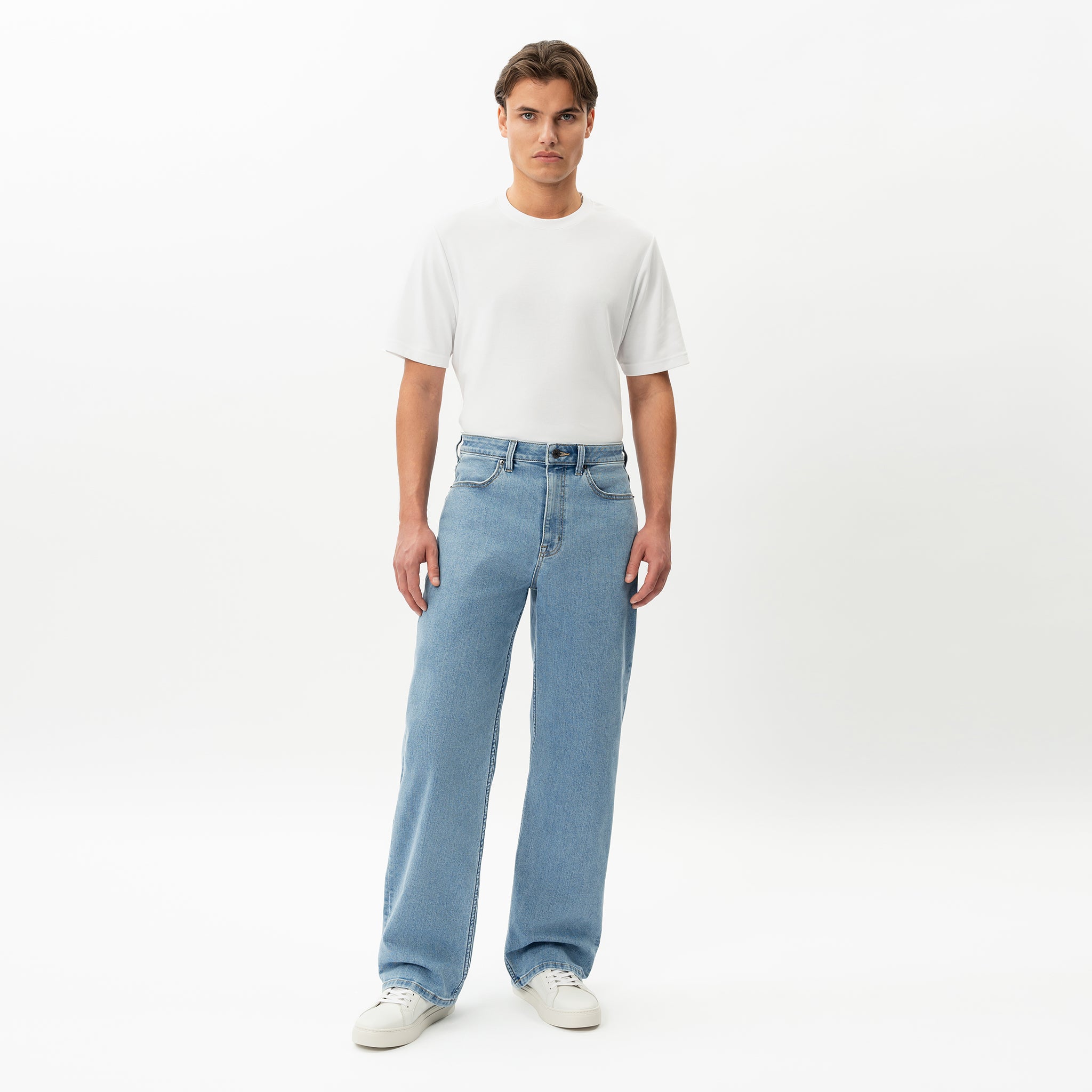Alternate full-body front view of the Wide Flextech™ Jeans in light blue