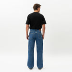 Back view of the Wide Flextech™ Jeans in mid blue