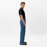 Side view of the Wide Flextech™ Jeans in mid blue