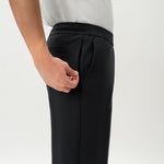 Detail of waistband and pocket construction on the black Socrates Classic straight-leg pant
