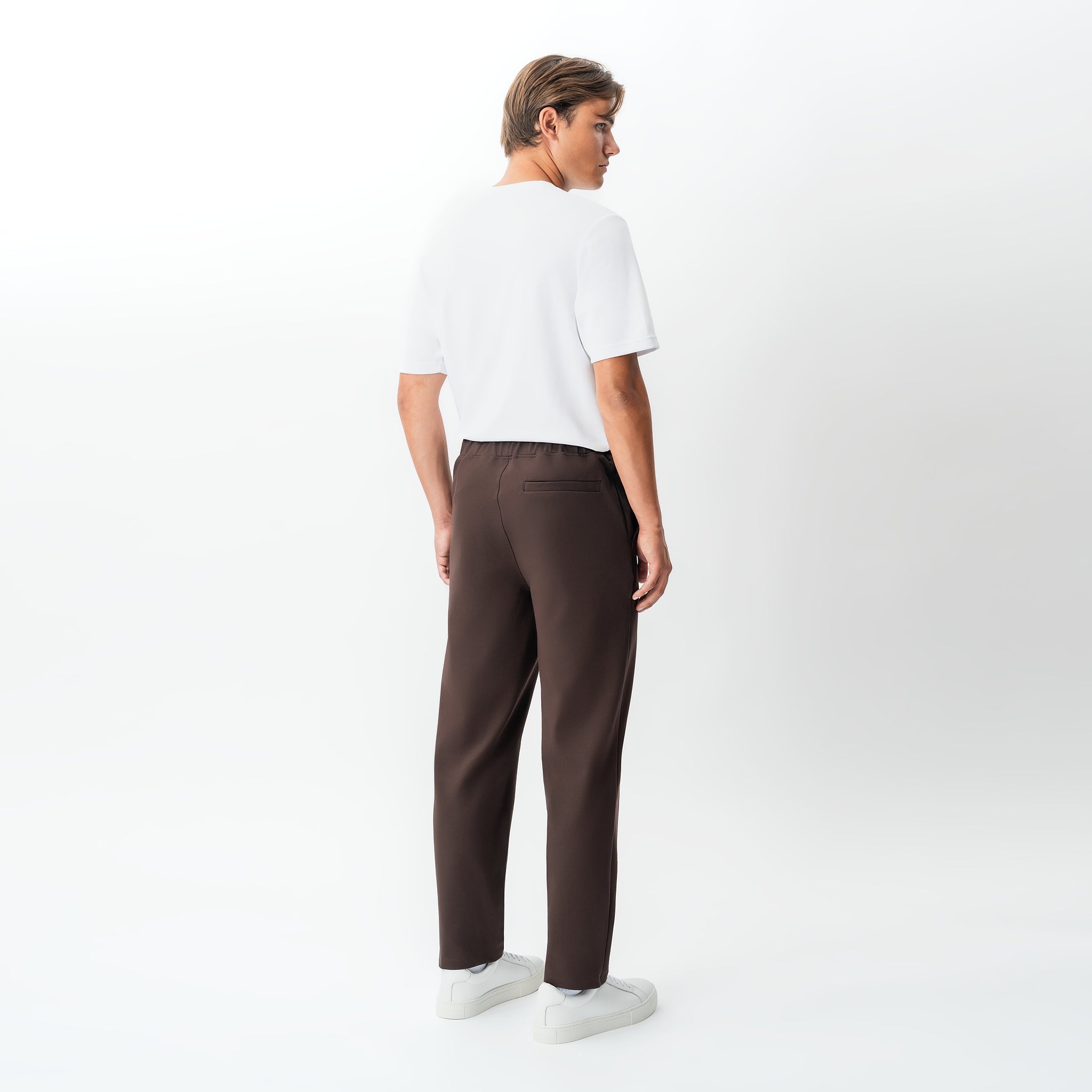 Angled back view of the Socrates Classic pant in brown
