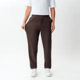 Full-body view showing the stretch of the brown Socrates Classic straight-leg pant fabric
