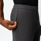 Detail of waistband and pocket construction on the grey Socrates Classic straight-leg pant

