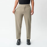 half-body view showing the stretch of the khaki Socrates Classic straight-leg pant fabric
