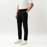 Angled front view of the Socrates Slim tapered pant in black
