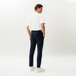 Back view of the Socrates Slim tapered pant in navy
