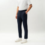 Angled front view of the Socrates Slim tapered pant in navy
