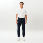 Full-body front view of the Socrates Slim tapered pant in navy
