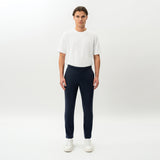 Full-body front view of the Socrates Slim tapered pant in navy
