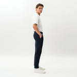 Side view of the Socrates Slim tapered pant in navy
