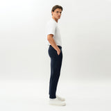 Side view of the Socrates Slim tapered pant in navy
