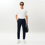 Styled look featuring the navy Socrates Slim Pant worn as an everyday outfit
