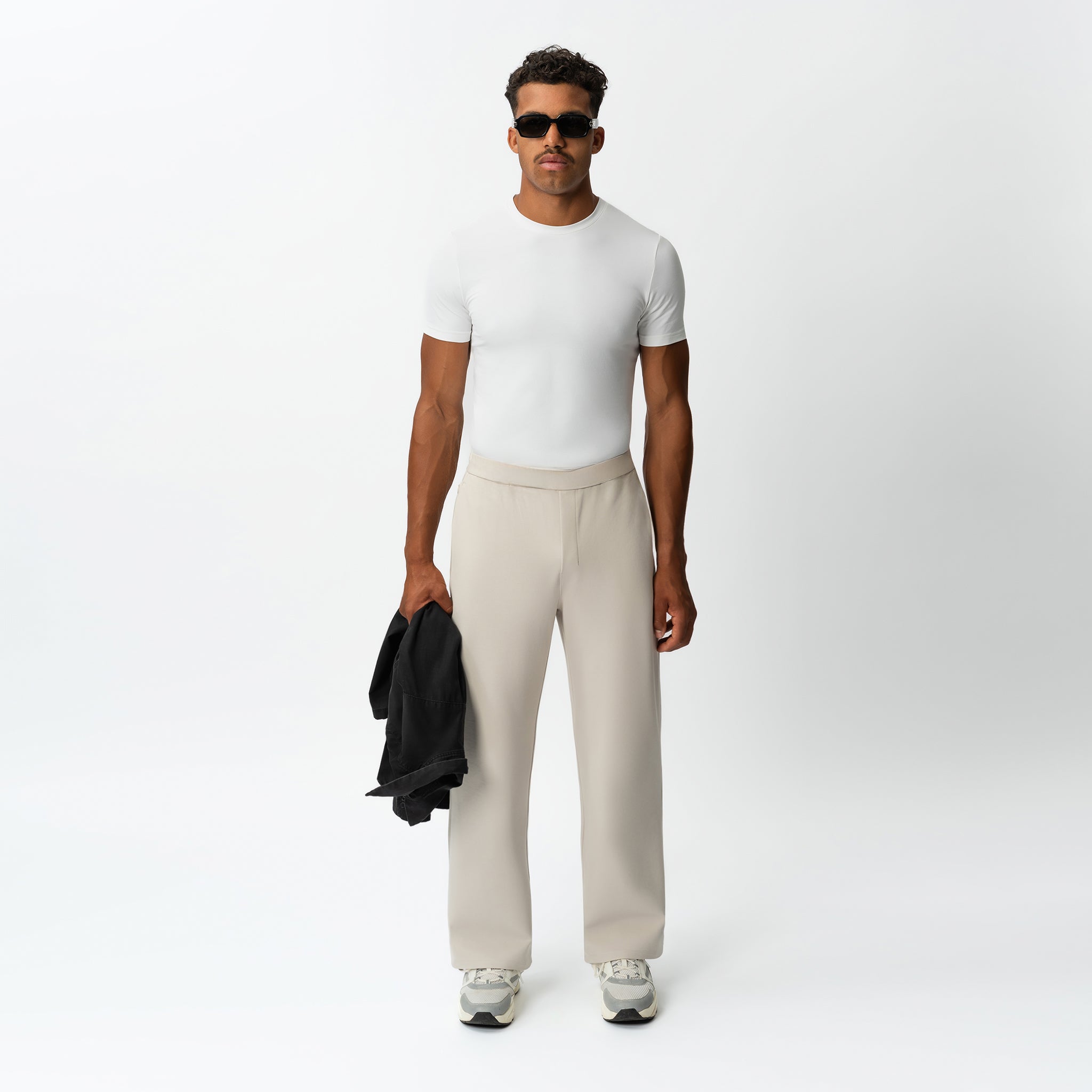 Styled look featuring the beige Socrates wide-leg pant worn as an everyday outfit