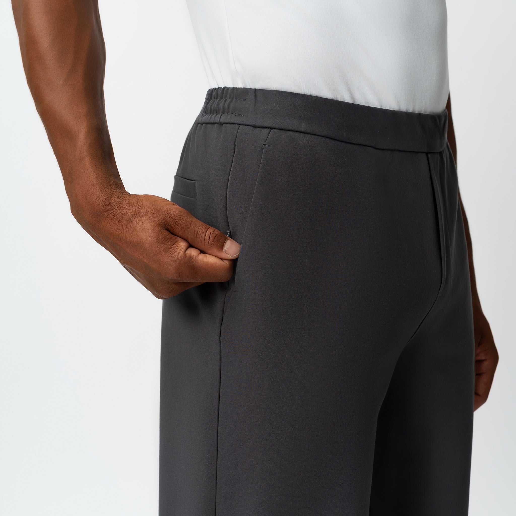 Detail of waistband and pocket construction on the grey Socrates Pant