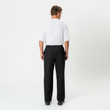 Back view of the black Socrates wide-leg pleated pant