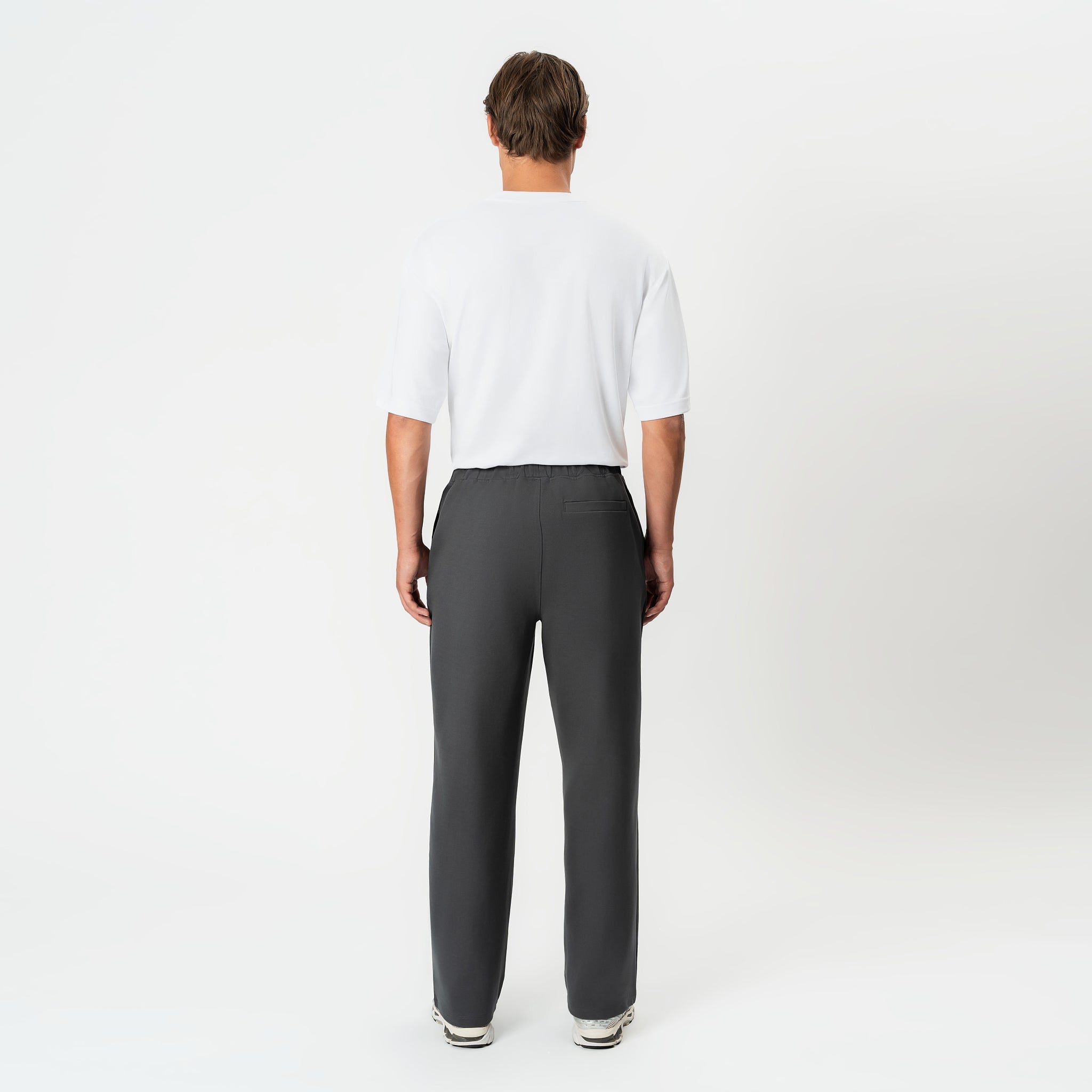 Back view of the grey Socrates wide-leg pleated pant
