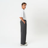 Side view of the grey Socrates wide-leg pleated pant
