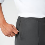 Detail of waistband and pocket construction on the grey Socrates wide-leg pleated pant
